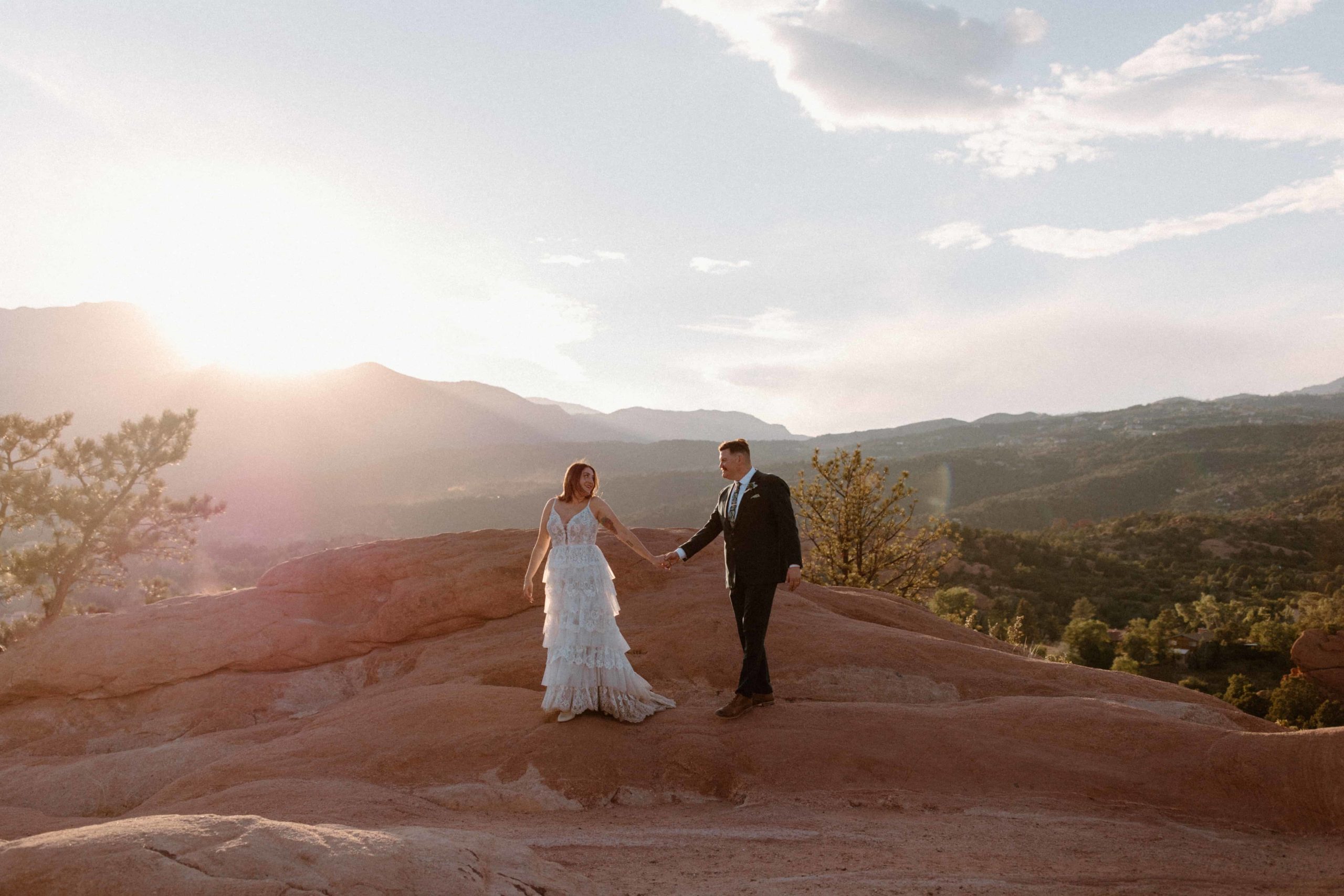 Couple gazing into each others eyes after eloping in the mountains