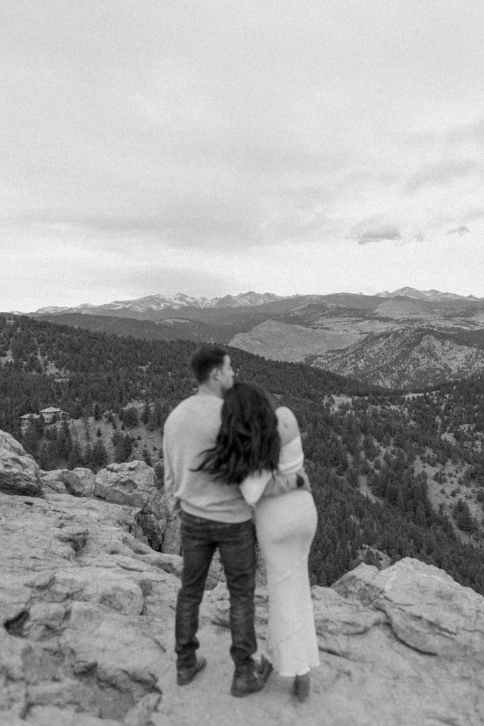 man and woman embracing at their Lost Gulch Overlook Sunrise Engagement Session