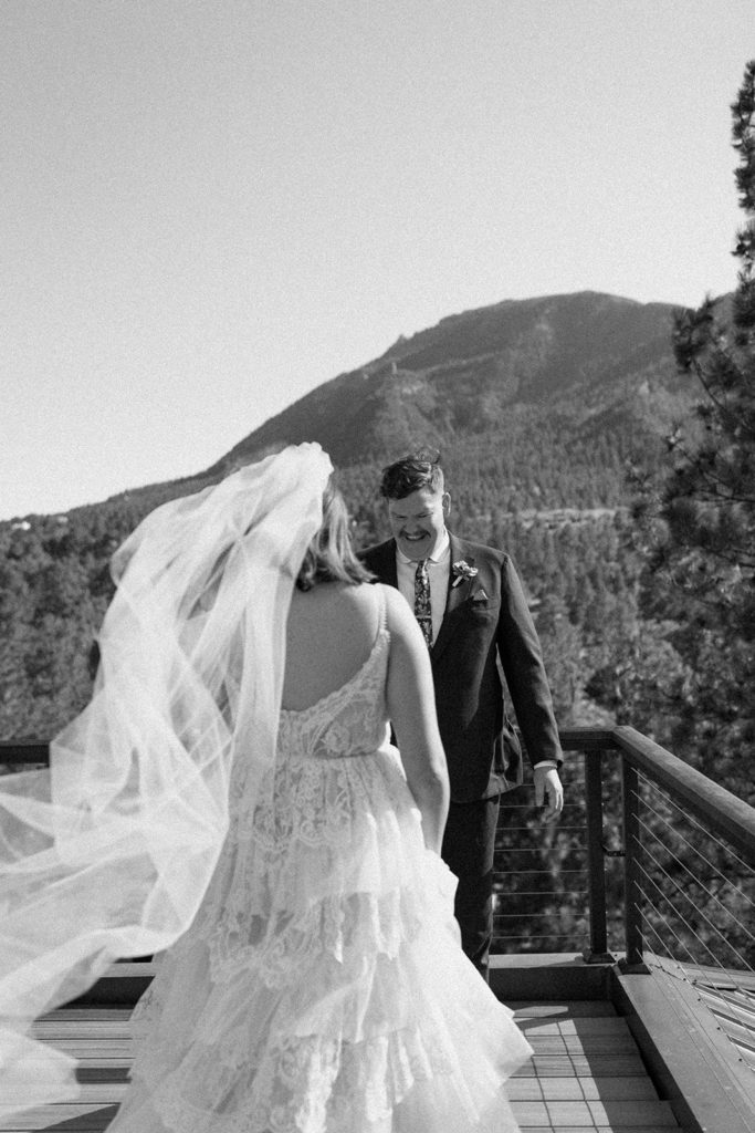 man seeing woman for the first time for their Garden of the Gods Elopement 