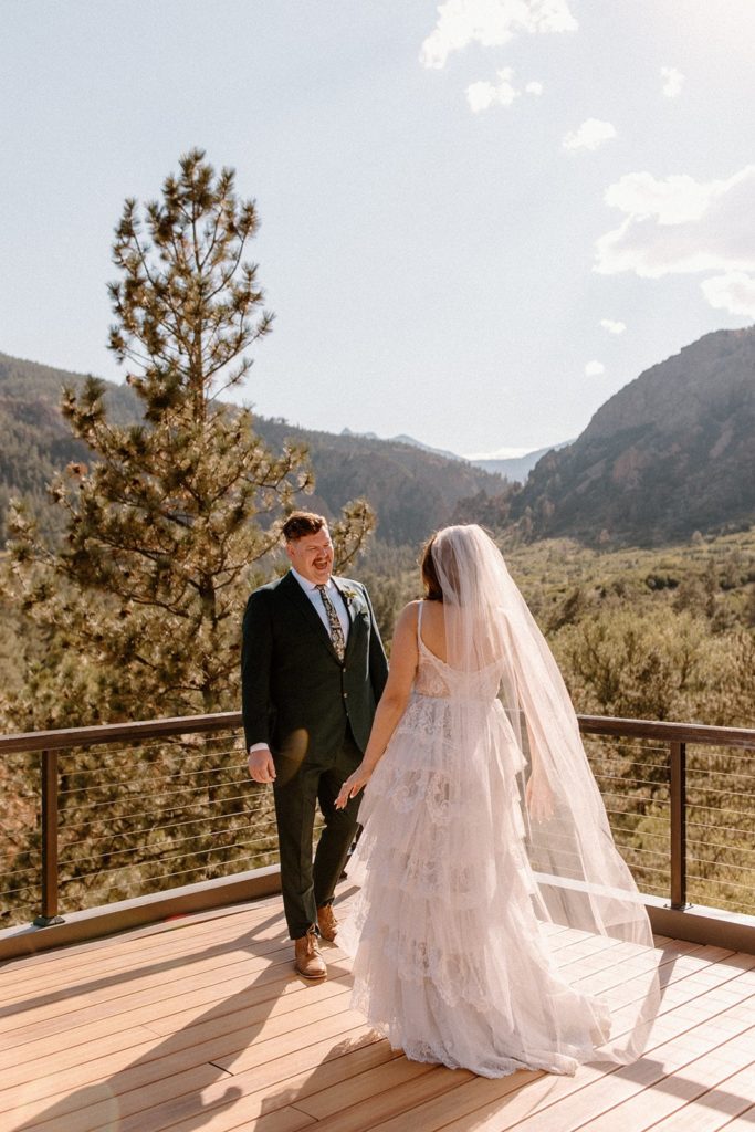 man seeing woman for the first time on their Garden of the Gods Elopement day