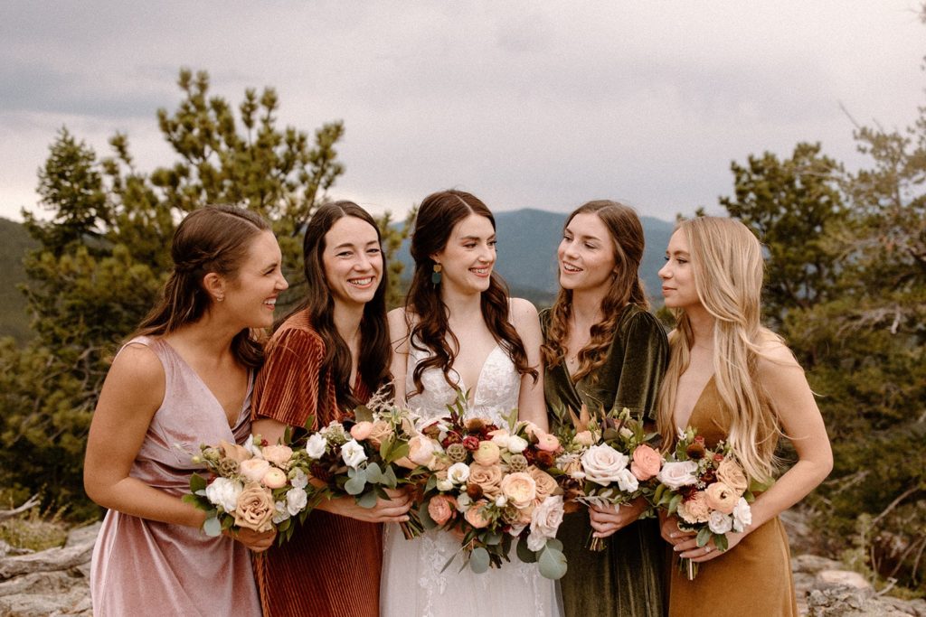 bride with her bridesmaids for her North Star Gatherings Wedding