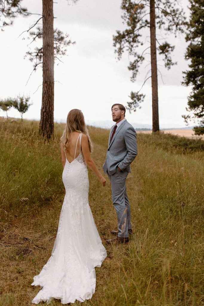 grooms first look at his bride for their Montana Elopement