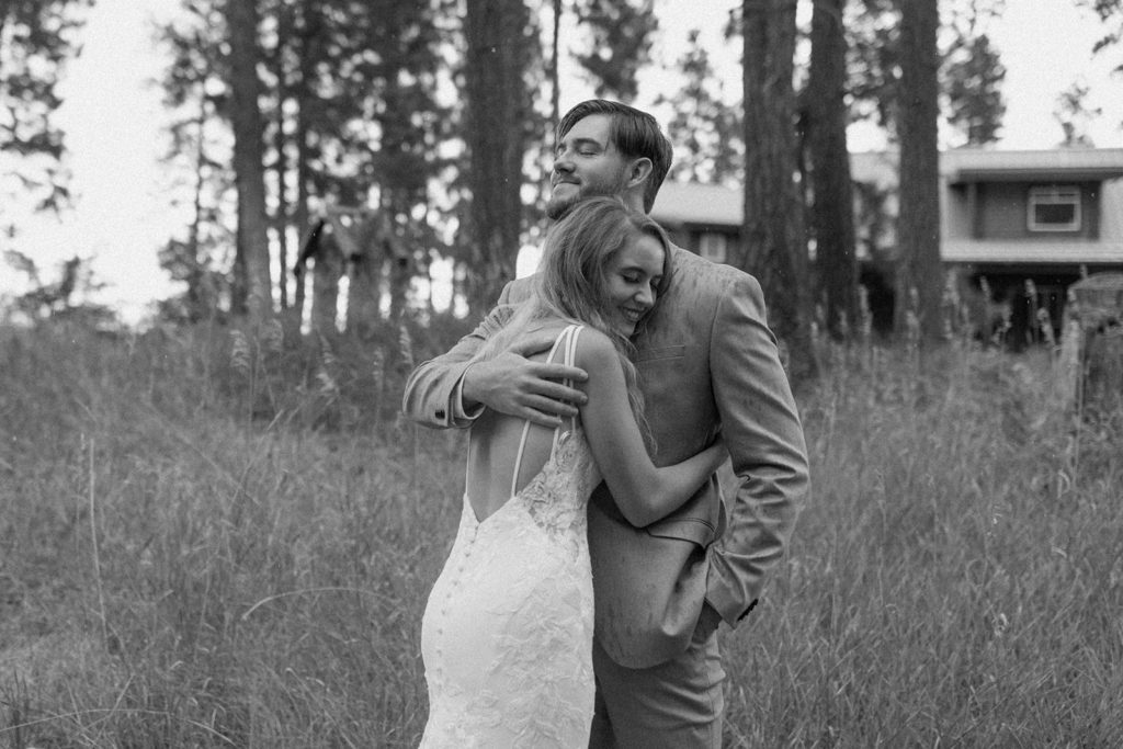 bride and groom happy after their first look for their Montana Elopement