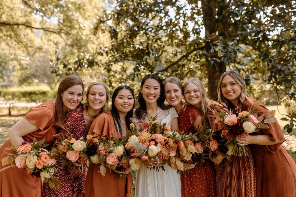 Bridesmaid photos with a terracotta and fall color palette.