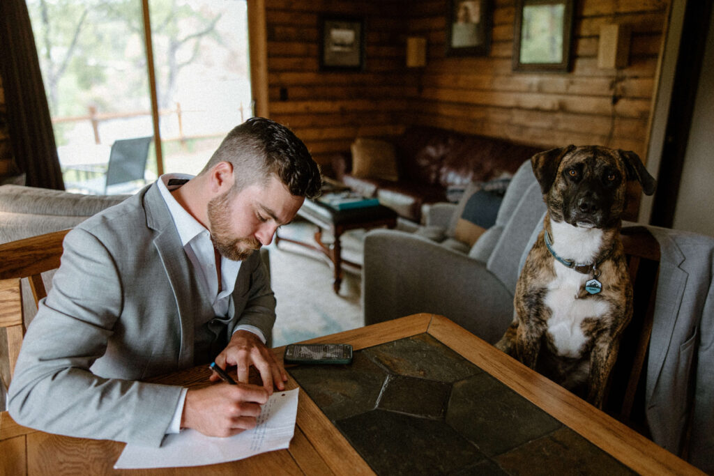 groom writing his vows