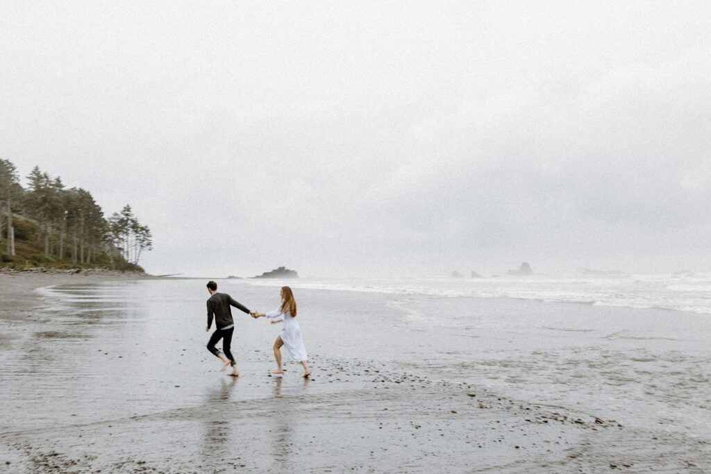 couple running on ruby beach 