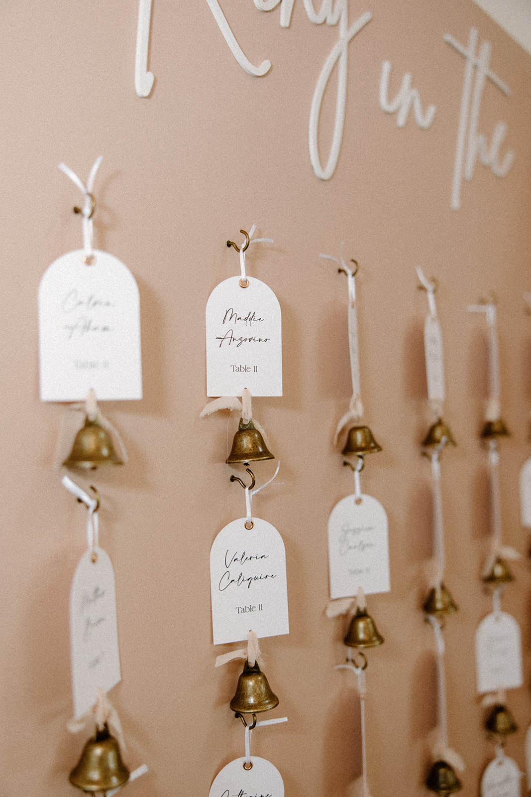 Golden Bell seating chart as a unique wedding details 